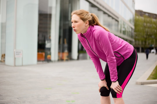 Young Runner Catching Her Breath