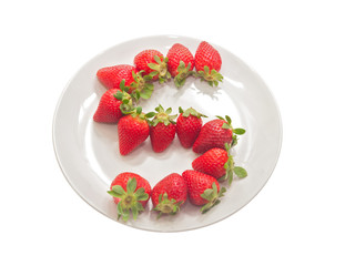 fresh strawberries arranged in s-shape