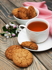 Cup of tea with oatmeal cookies