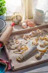 Obraz na płótnie Canvas Pasta with fresh ingredients in the rustic kitchen