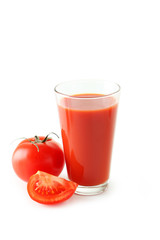 Fresh red tomatoes and tomato juice in glass 
