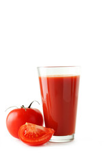 Fresh red tomatoes and tomato juice in glass 