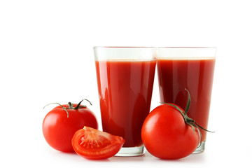 Fresh red tomatoes and tomato juice in glass 