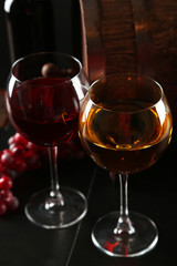 Red and white wine glass with on black background