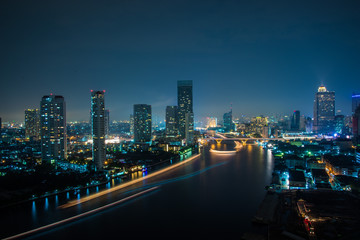 Fototapeta na wymiar Bangkok city skyline by the river