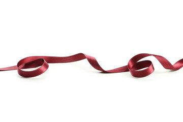 Naklejka premium Red ribbon on white background