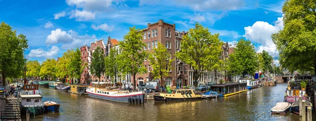 Gordijnen Kanaal en brug in Amsterdam © Sergii Figurnyi