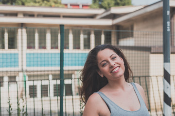 Beautiful curvy girl posing in an urban context