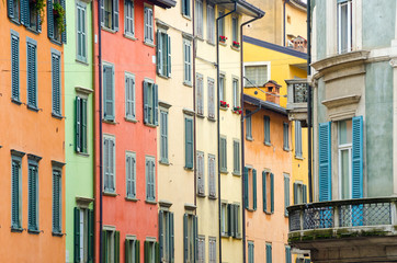 Italian houses with colorful walls and windows in Bergamo - obrazy, fototapety, plakaty