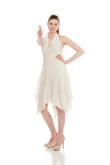 Naklejka premium Model isolated thumbs up success