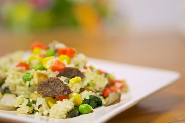Fried rice vegetarian with peas carrots and corn