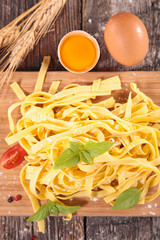 tagliatelle on board with ingredients