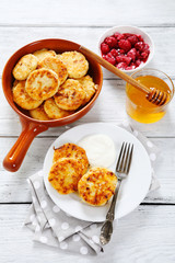 Delicious cheese pancakes on  plate