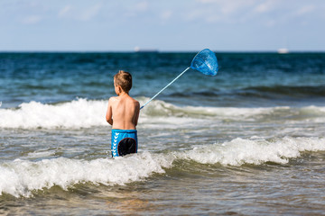 Boy with fishing net