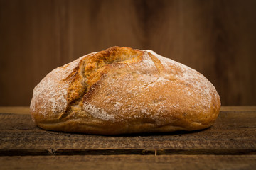 white bread over wooden background