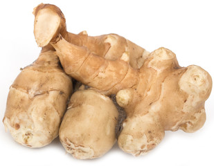 Jerusalem artichoke tubers on a white background