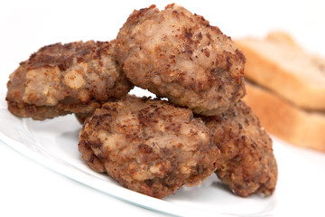 cutlet and bread on a white background