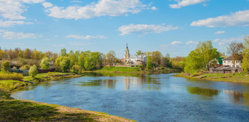 Rural landscape with  river and the Church on  river