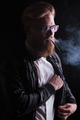 young business man searching in his inside pocket