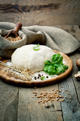 Pizza dough on old wooden table