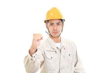 ガッツポーズの作業員