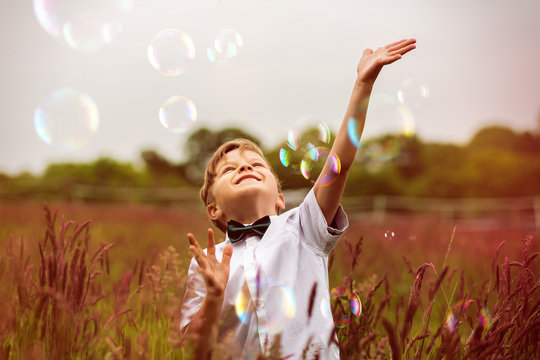 Child with Soap Bubbles