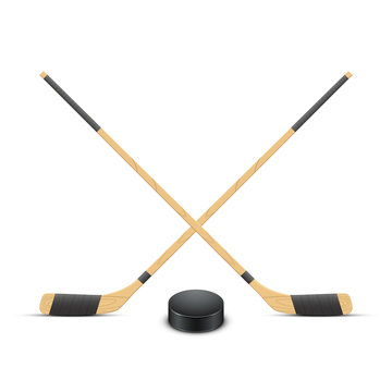 Ice Hockey puck and sticks. Vector.