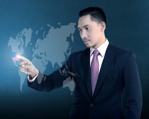 Asian business man touch USA on virtual world