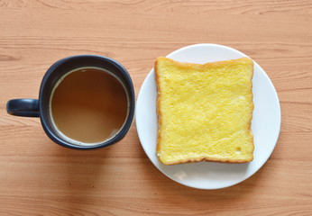 coffee and slice bread topping butter