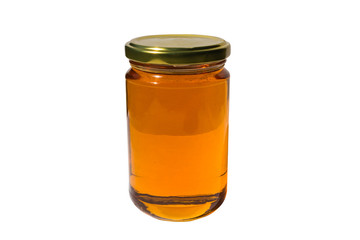 Glass jar of honey with clipping path