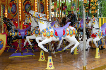 Fototapeta na wymiar Fairground ride horses. Carnival Horses.