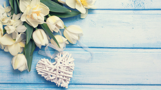 Background with fresh flowers and decorative heart