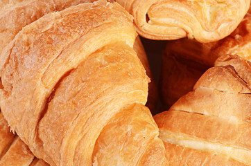 Heap of fresh rolls as background