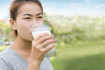 women drinking milk healthy lifestyle outdoor