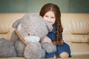 Cute little girl with teddy bear
