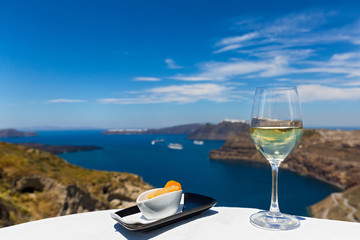 Glass of fresh wineand fruit  by the sea