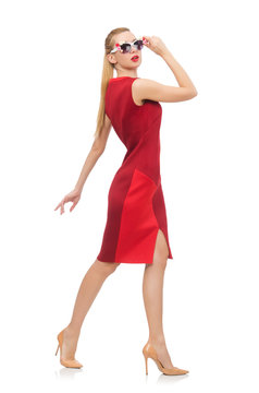 Pretty young woman in red dress isolated on white