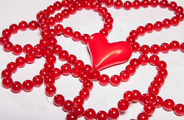 Red beads and red heart - valentine's day concept