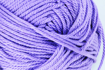 Close up of skein of purple thread