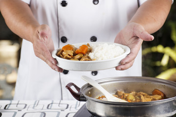 Chef presented Japanese pork curry with steam rice