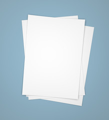 Three white paper sheets on blue