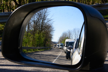 Traffic reflection in the rear view mirror