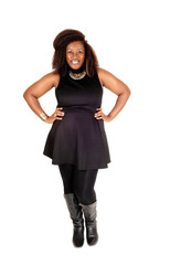 Smiling African woman standing.