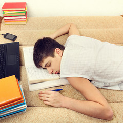 Student sleeping on Sofa