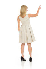 Fototapeta premium Model isolated back pointing