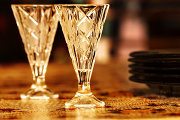 Two vodka shot glasses on table © dashabelozerova