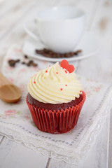 red velvet cupcakes with red heart on top