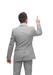 businessman pointing finger or touching something