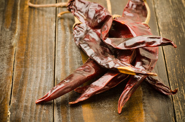 Dry chili on wooden background