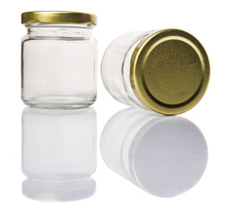 Empty mason jar over white background © akulamatiau